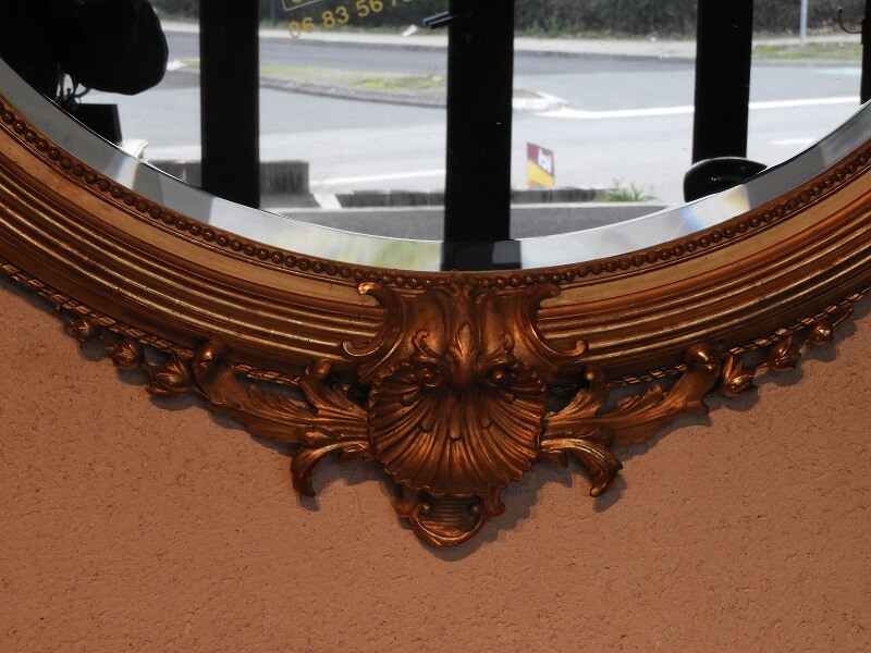 Bas Miroir ovale Louis XV en bois doré