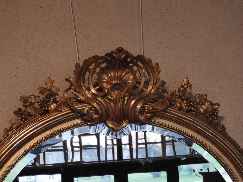 Haut Miroir ovale Louis XV en bois doré