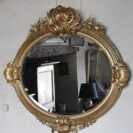 Miroir ovale Louis XV en bois doré